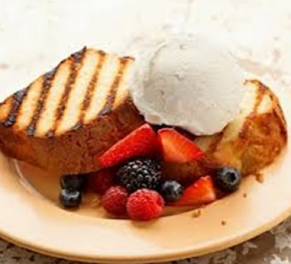 Grilled Cake Topped With Berries and Yummy Cream
